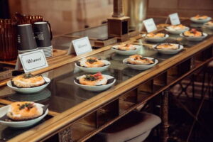 Montreal: Old Montreal Food and Drink Guided Walking Tour - Starting at Crew Collective & Café: a smoked salmon bagel in a bank-turned café
