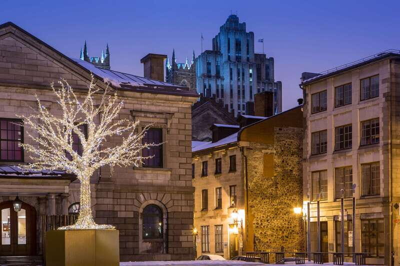 Old Montréal Small-Group Christmas Tour - Place d’Armes, Notre-Dame Basilica, and Jacques-Cartier Place, lit up